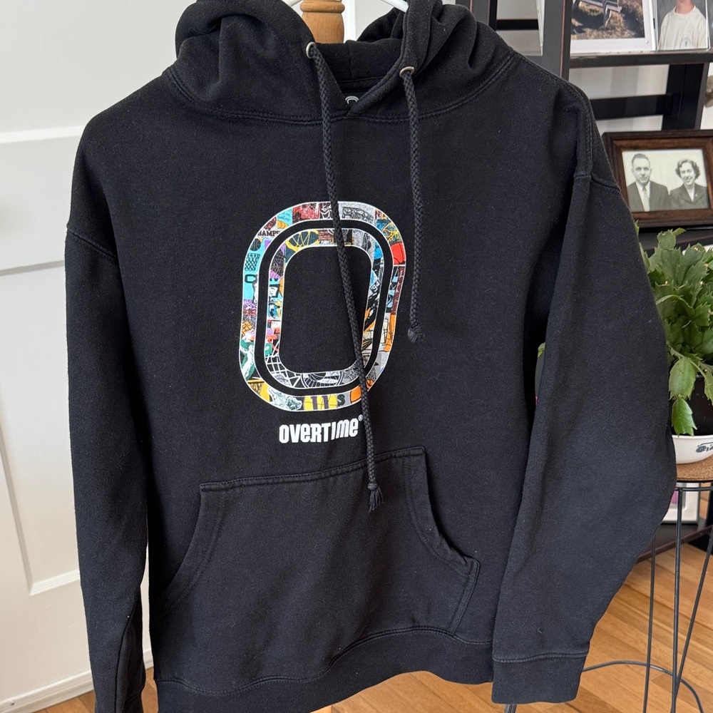 Black Hoodie with Colorful Graphic O Logo from Overtime